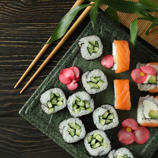 Concept of tasty food with sushi, top view